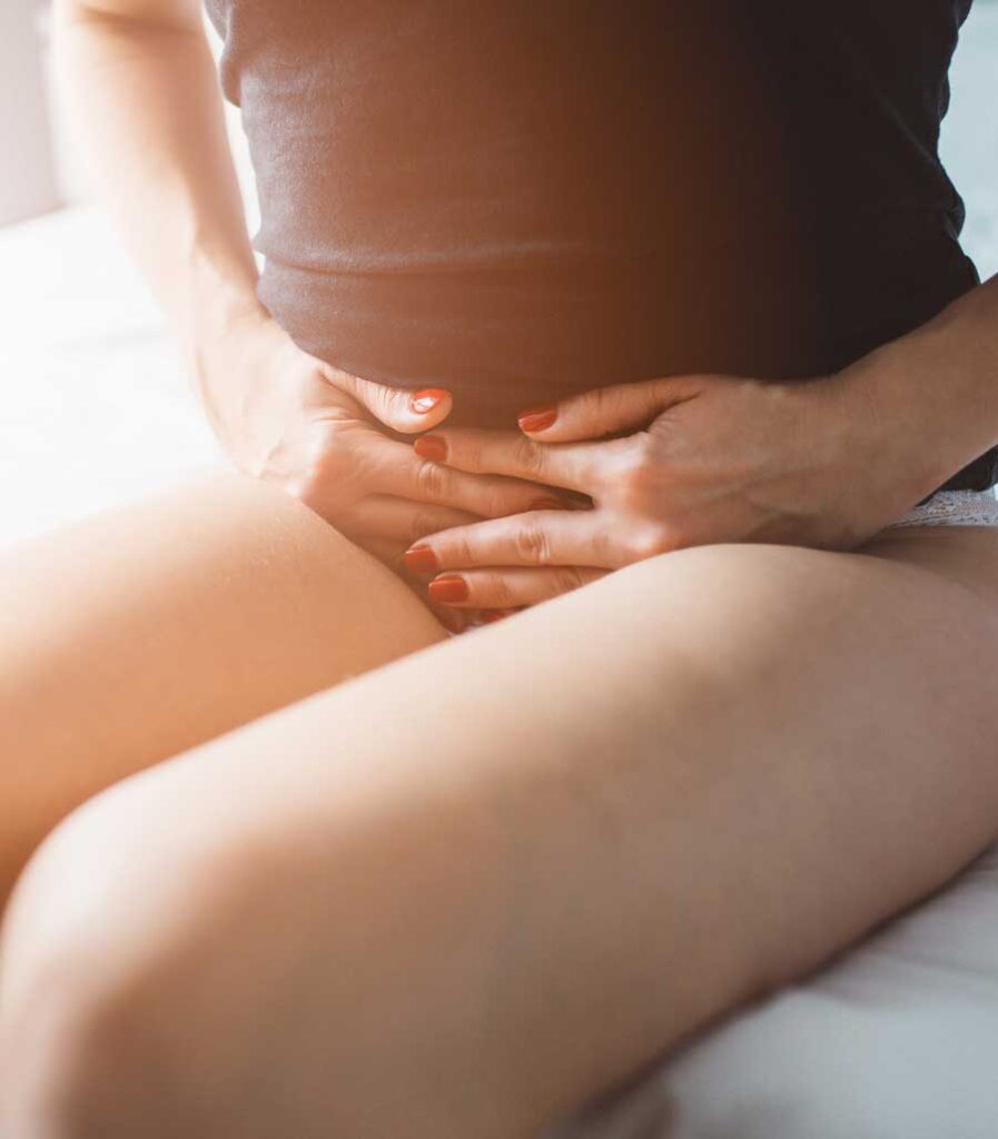 Woman with menstrual cramps | Acupuncture for Menstrual Cramps and PMS